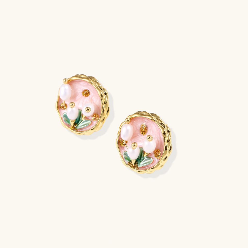 Gold flower stud earrings with pearl center