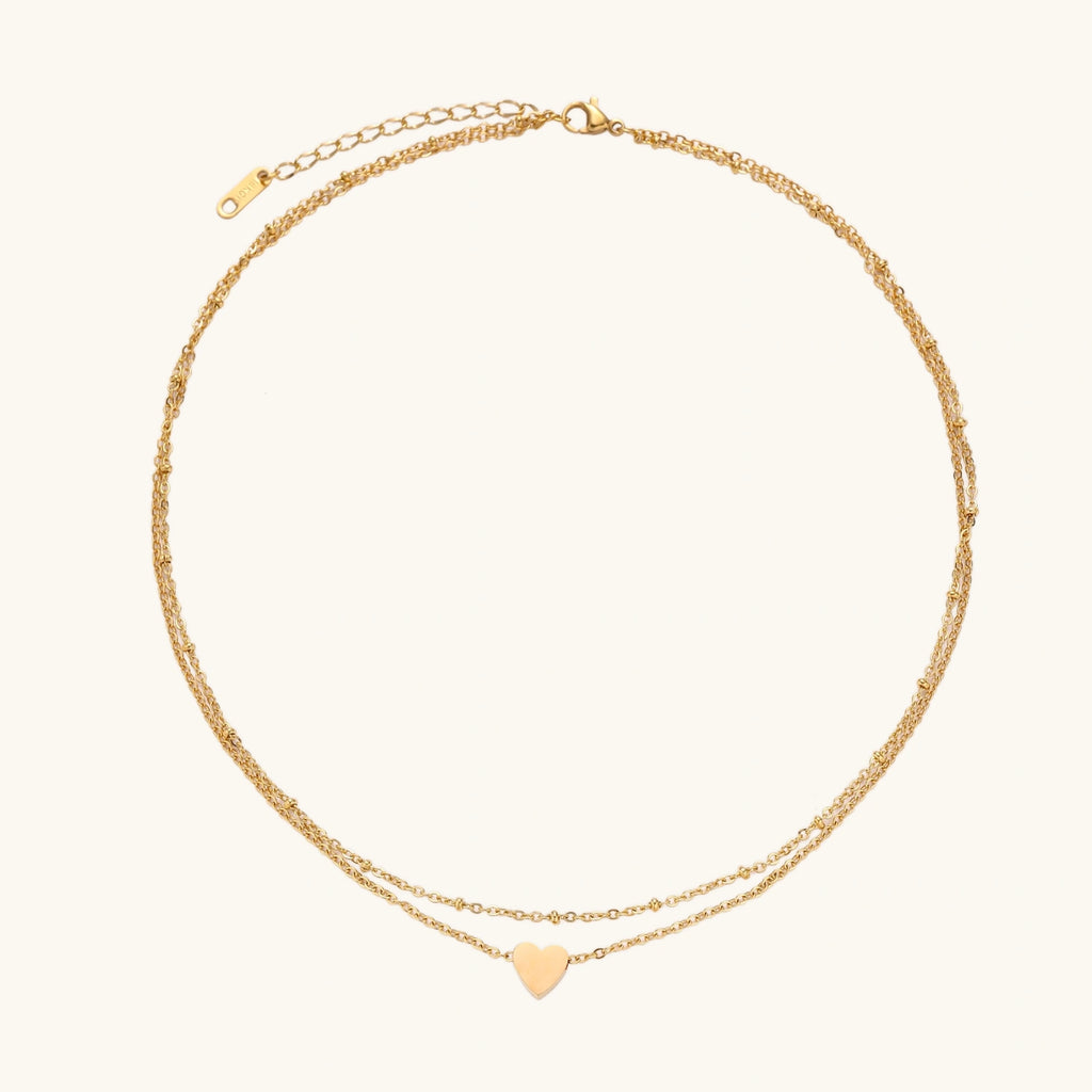 Gold layered necklace with heart pendant