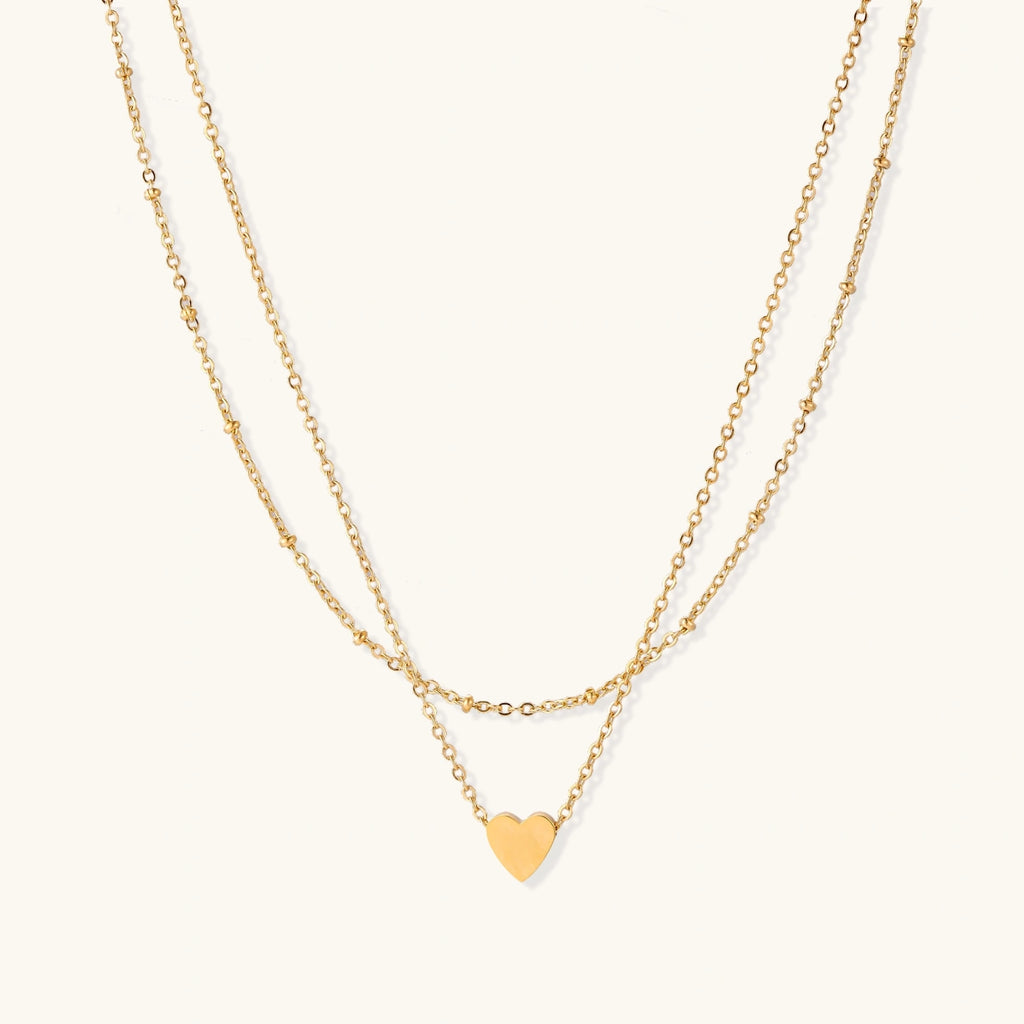 Gold layered necklace with heart pendant