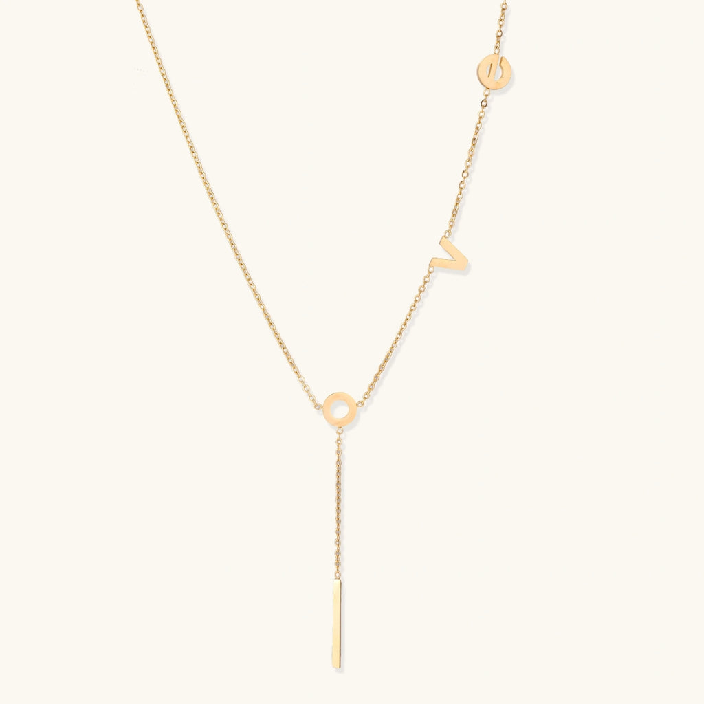 Gold lariat necklace with sliding pendant
