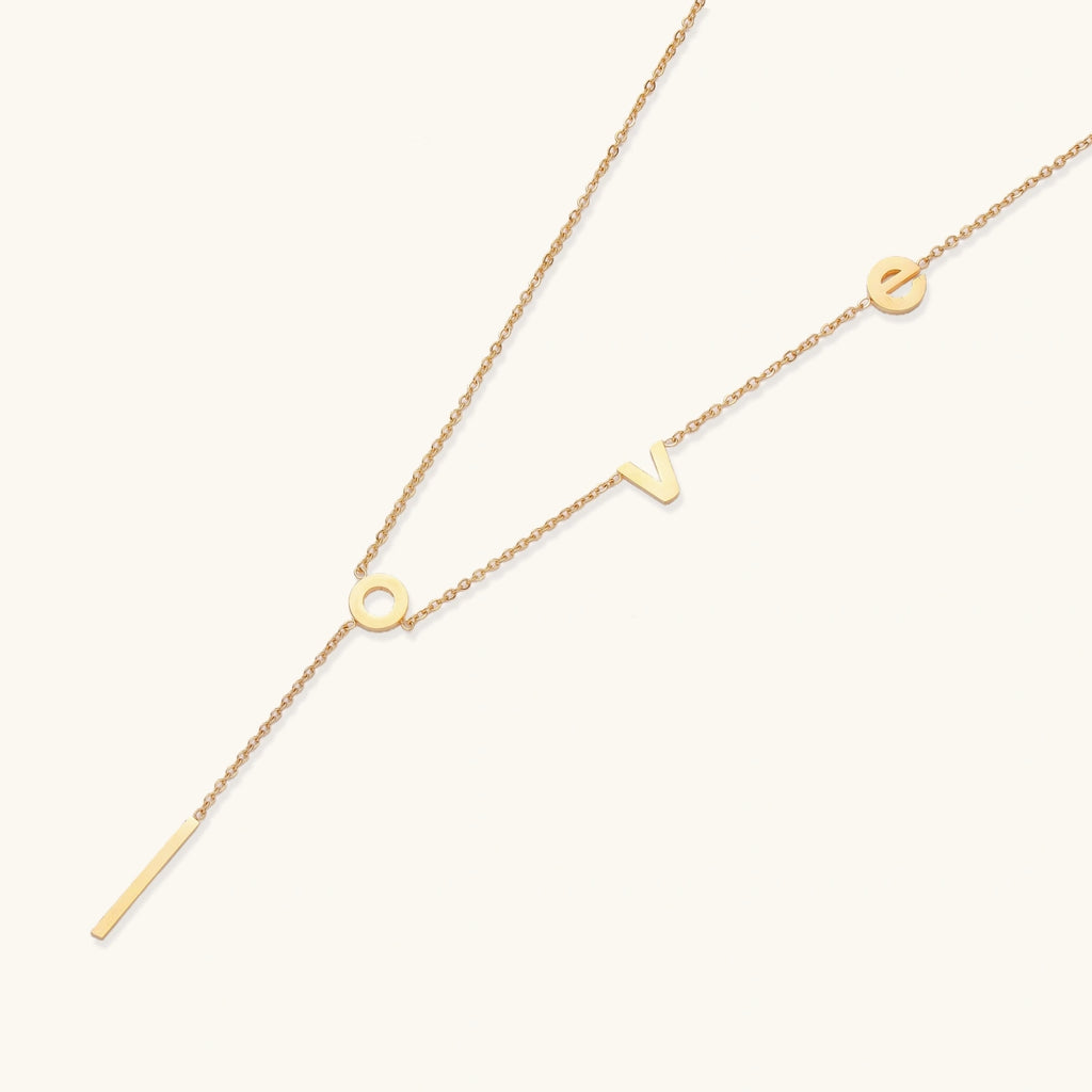 Gold lariat necklace with sliding pendant