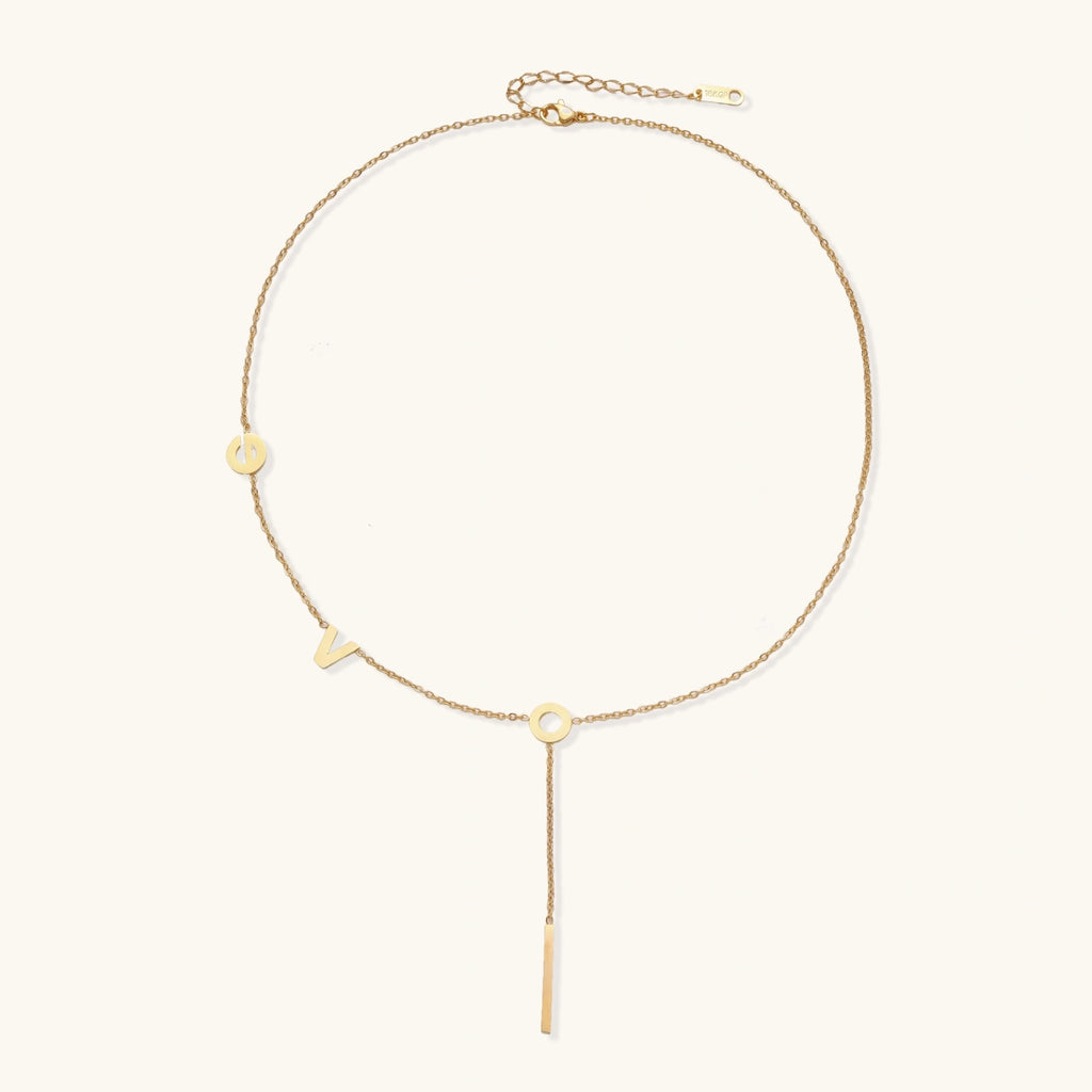 Gold lariat necklace with sliding pendant