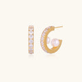 Gold hoop earrings with pavé stars and freshwater pearl drops