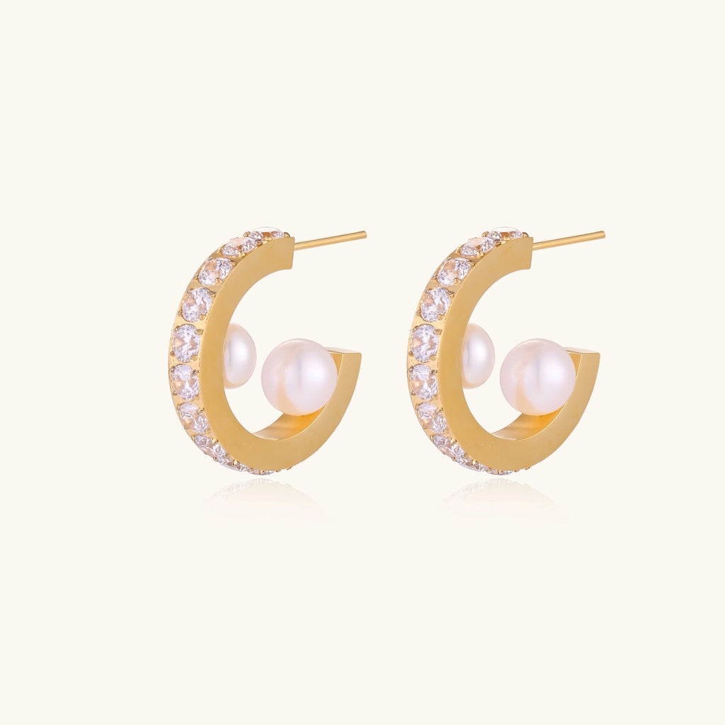 Gold hoop earrings with pavé stars and freshwater pearl drops