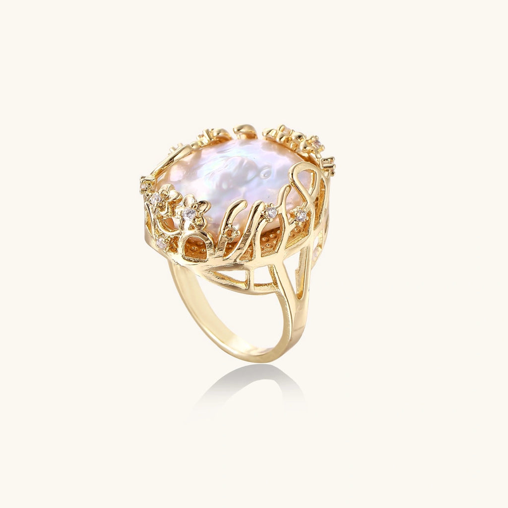 Gold crown-motif ring with pavé crystal band
