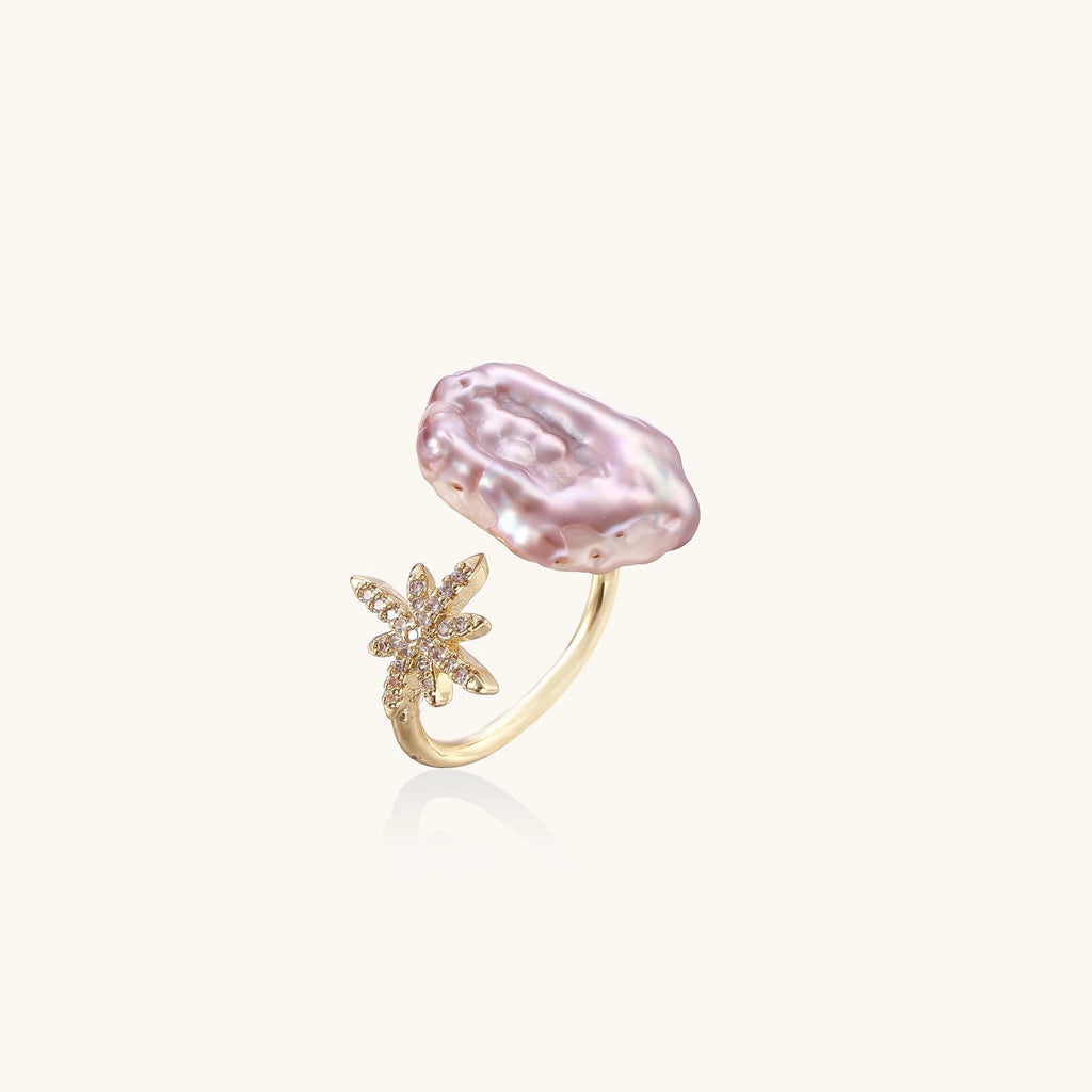 Gold ring with scattered pavé crystal star design