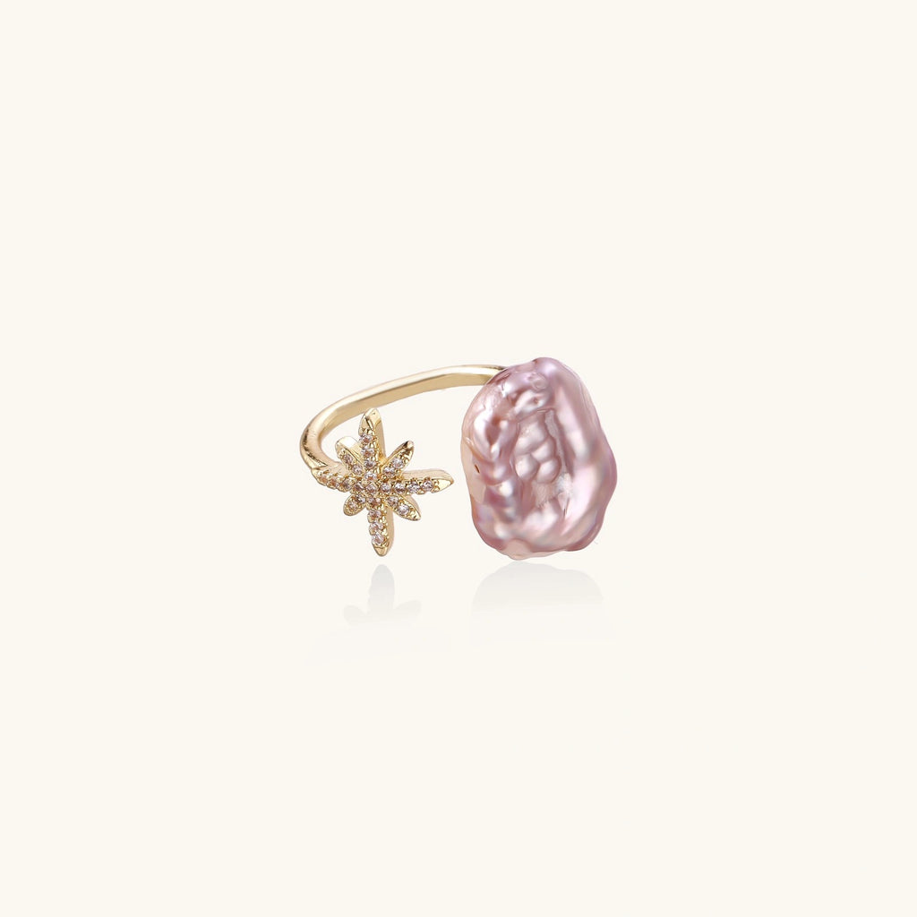 Gold ring with scattered pavé crystal star design