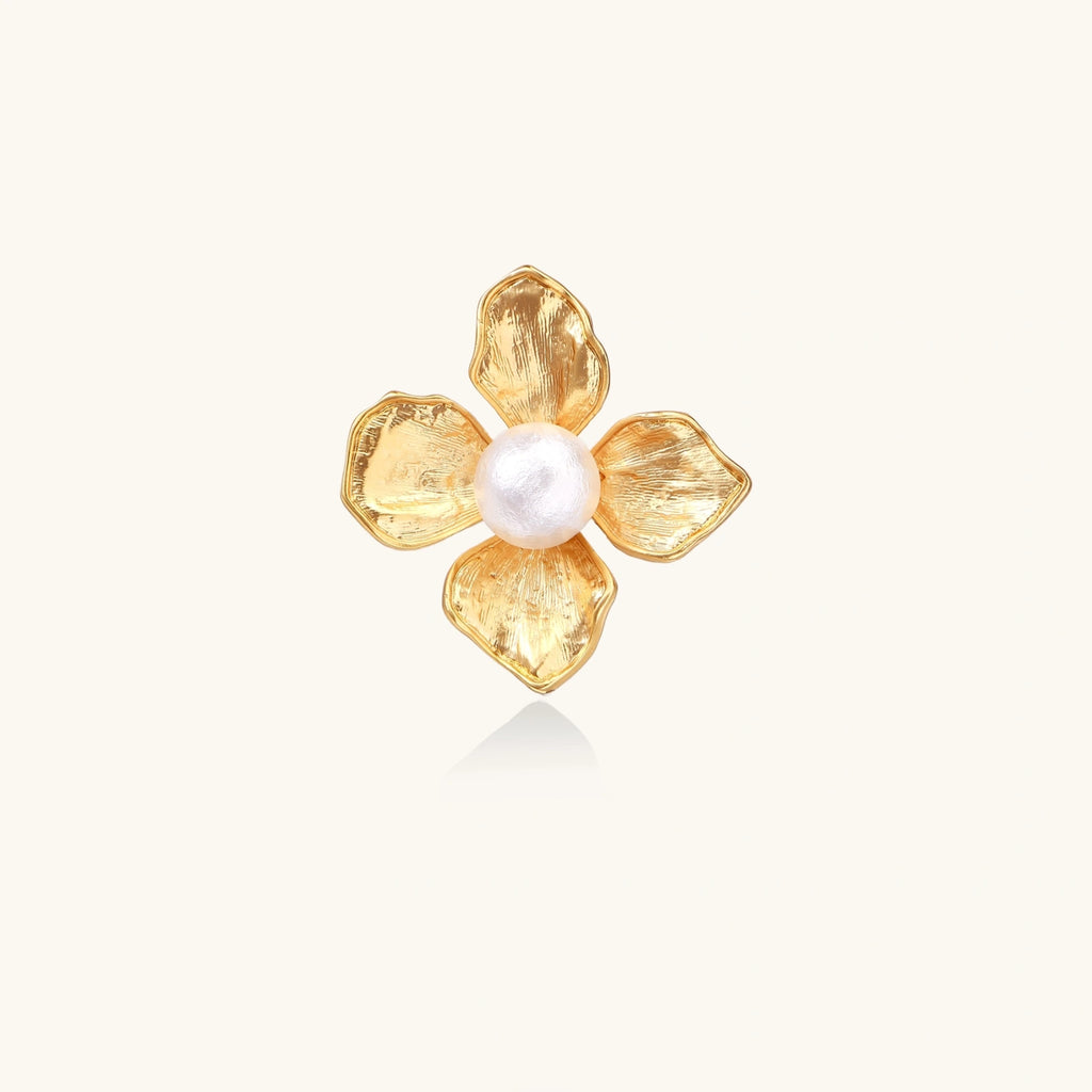 Gold statement ring with pearl flower design