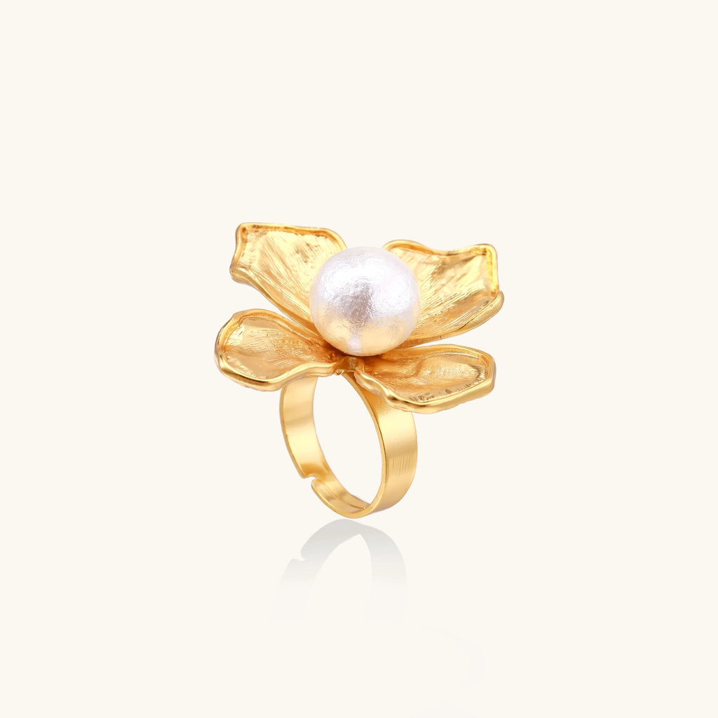 Gold statement ring with pearl flower design