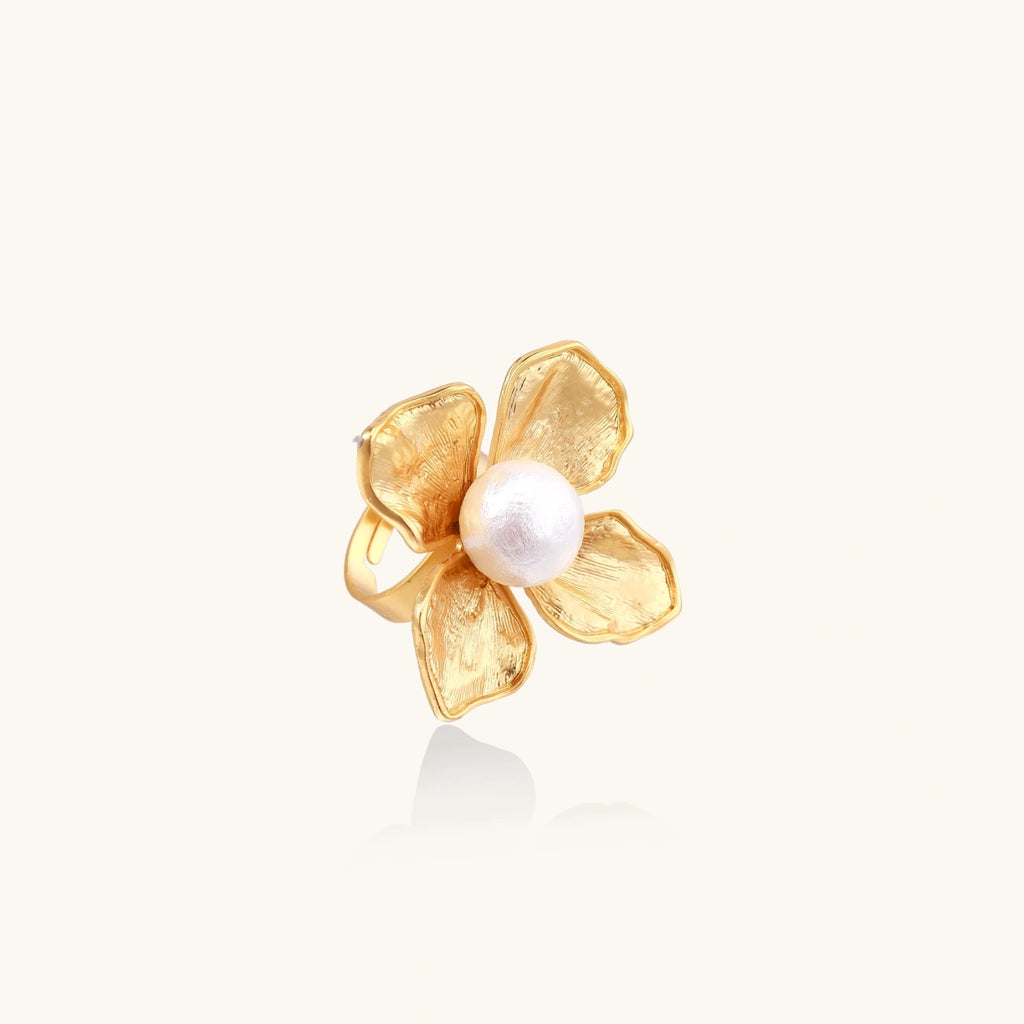 Gold statement ring with pearl flower design