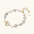 Gold bracelet with baroque pearls and crystal accents